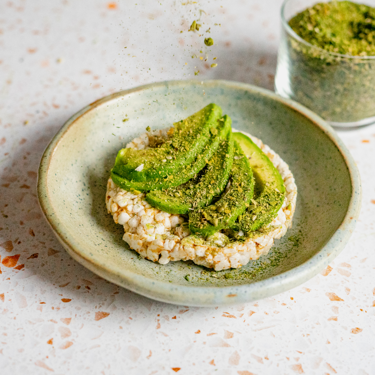 Rice cake topped with avocado